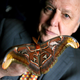 Illustration for article titled David Attenborough looks tiny beside the worlds biggest moth